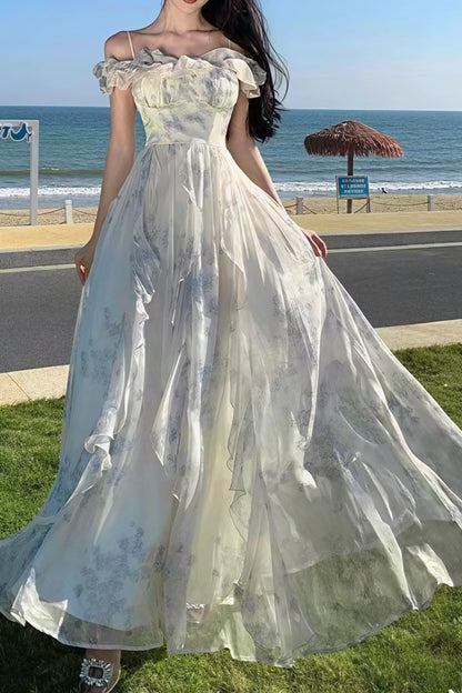 Vestido largo floreado con volantes y tirantes finos
