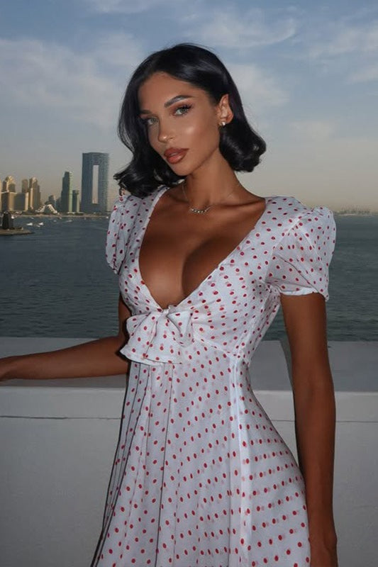 Minivestido sexy con estampado de lunares, escote pronunciado y manga abullonada