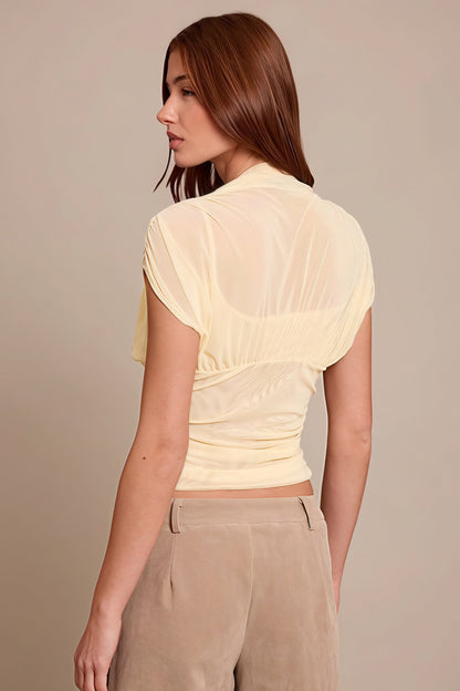 Blusa sin mangas de malla con cuello redondo y color sólido