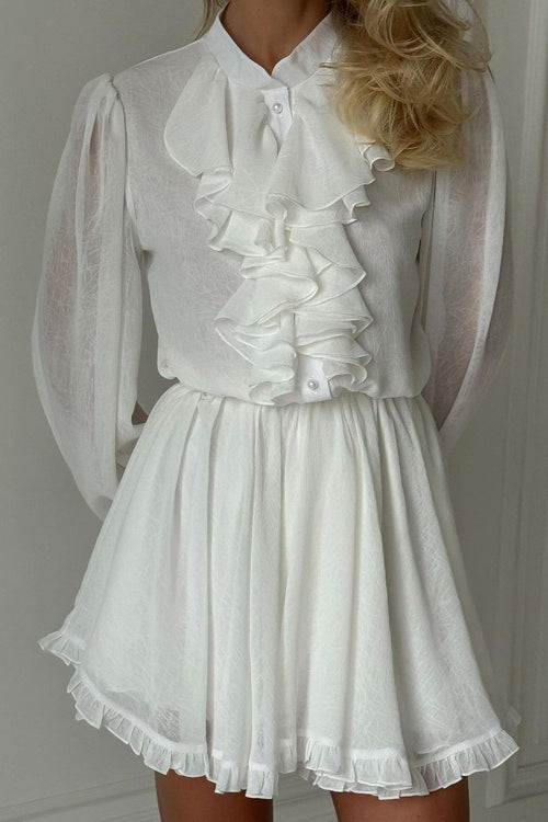 Mini vestido elegante de manga larga con cuello alto y volantes