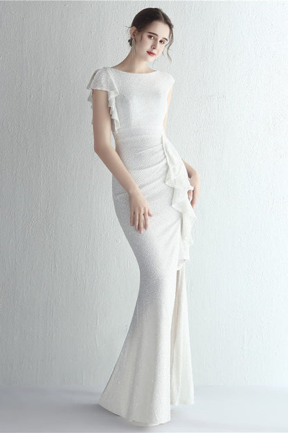 Vestido de gala de sirena con purpurina, cuello alto y abertura