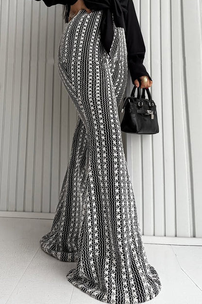 Pantalones acampanados de punto elástico a rayas