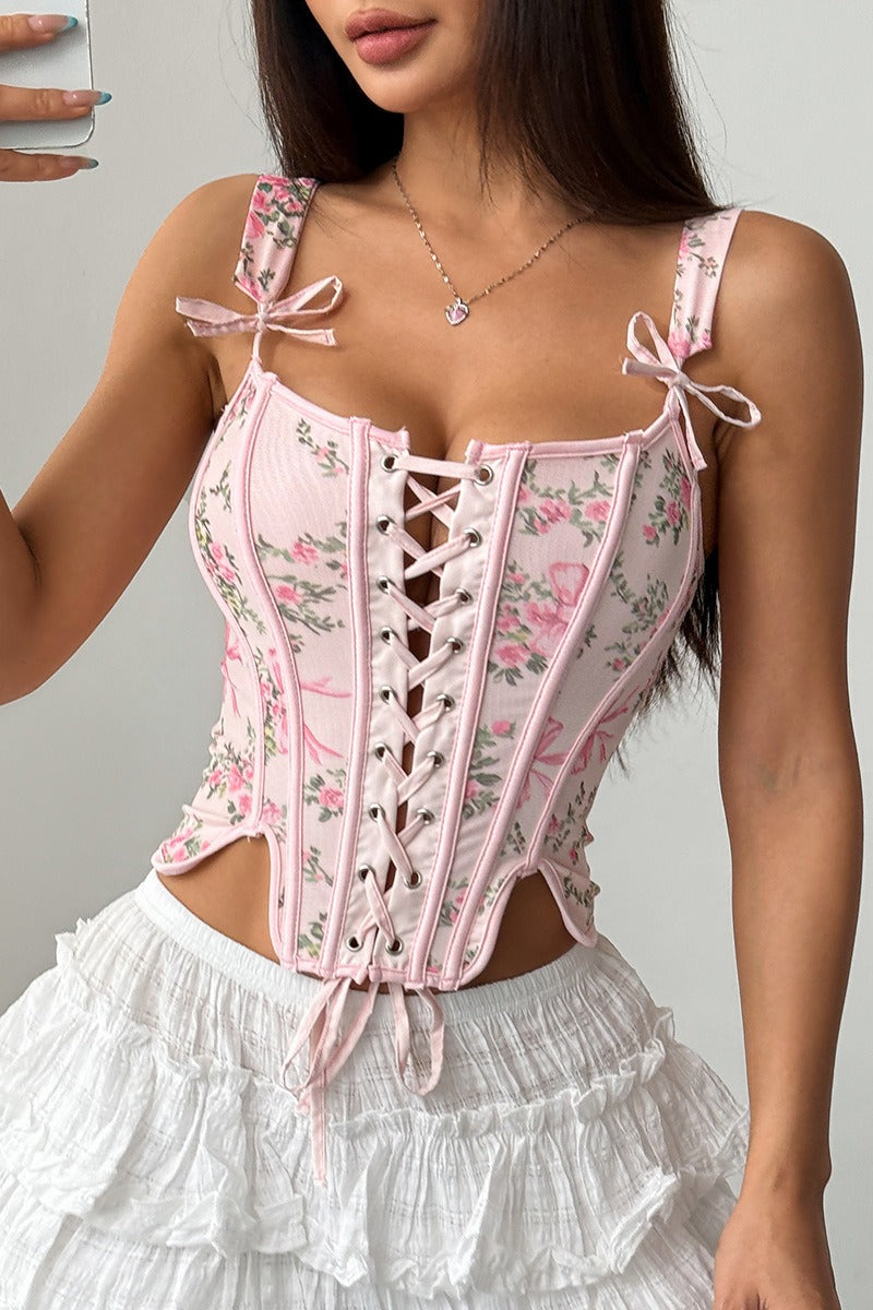 Top corto con estampado floral, varillas, lazo cruzado y lazada