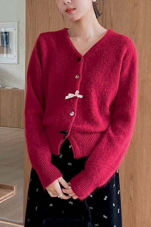Cárdigan con botones, cuello en V y lazo decorativo