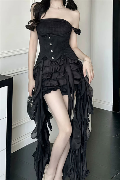 Minivestido fluido halter con borlas y bajo irregular