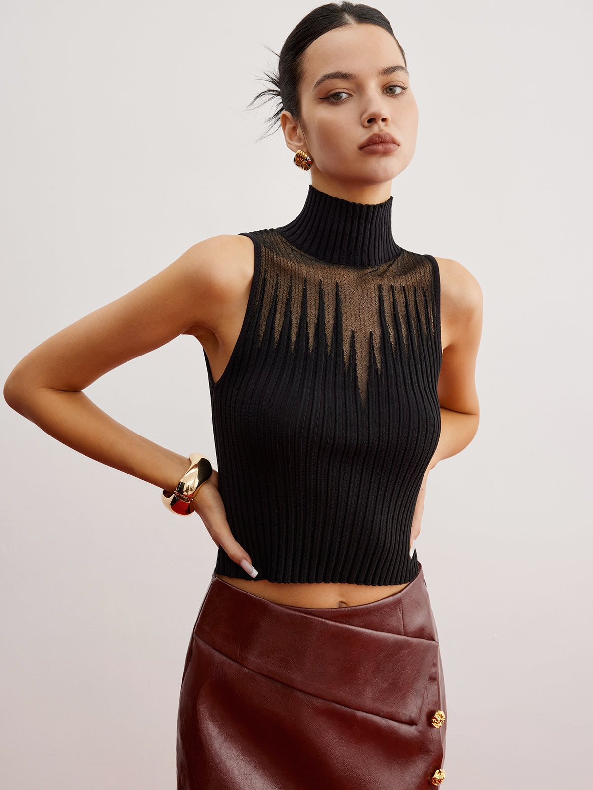 Chaleco de punto cropped con paneles transparentes