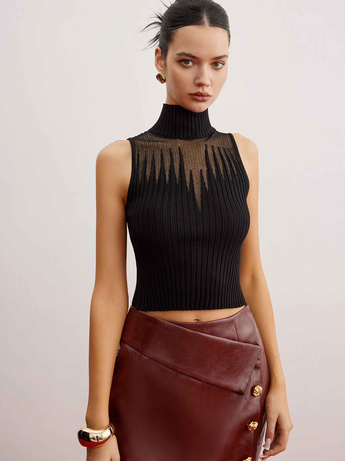 Chaleco de punto cropped con paneles transparentes