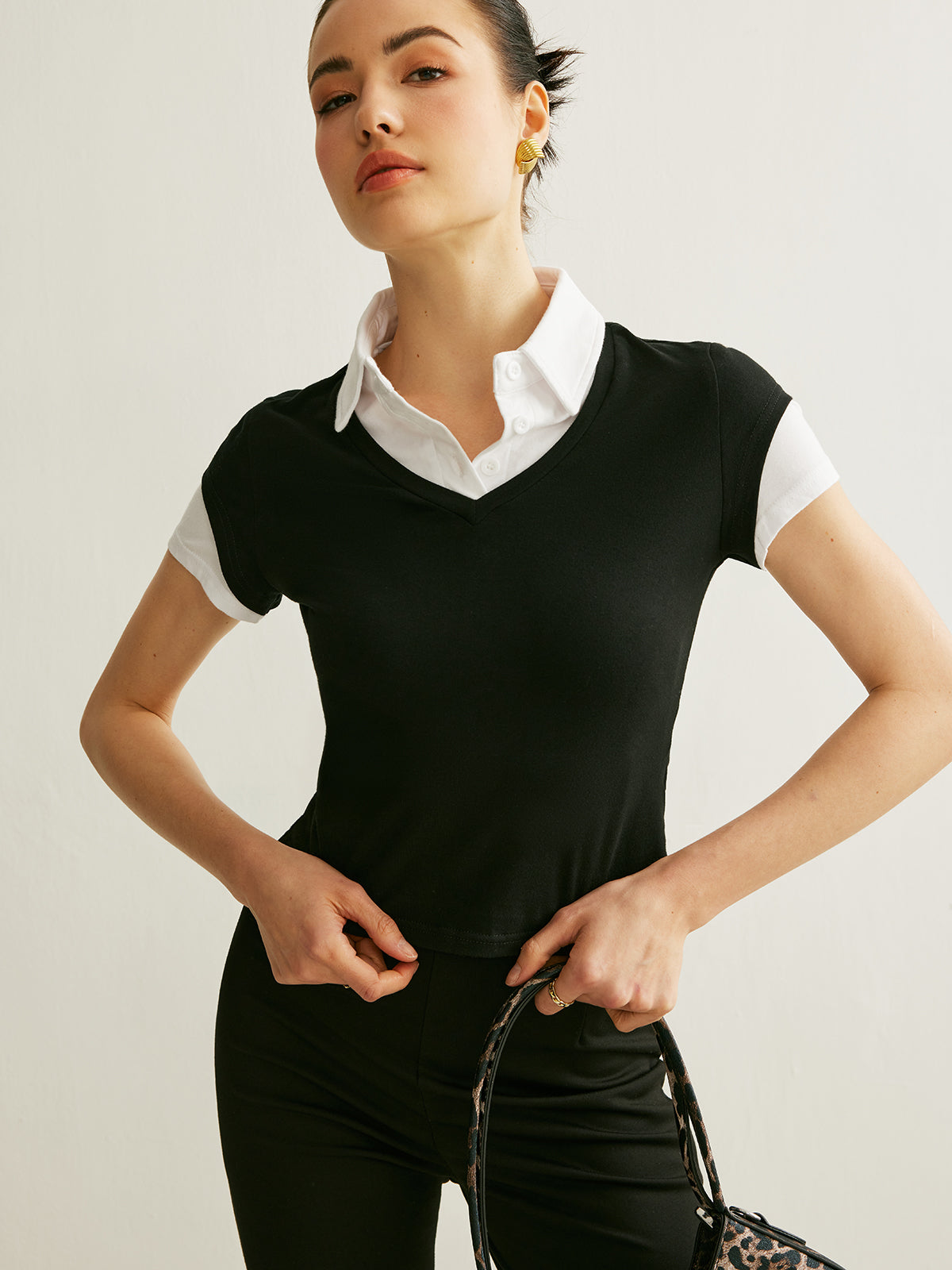 Camiseta de manga corta con cuello tipo polo y bloques de color
