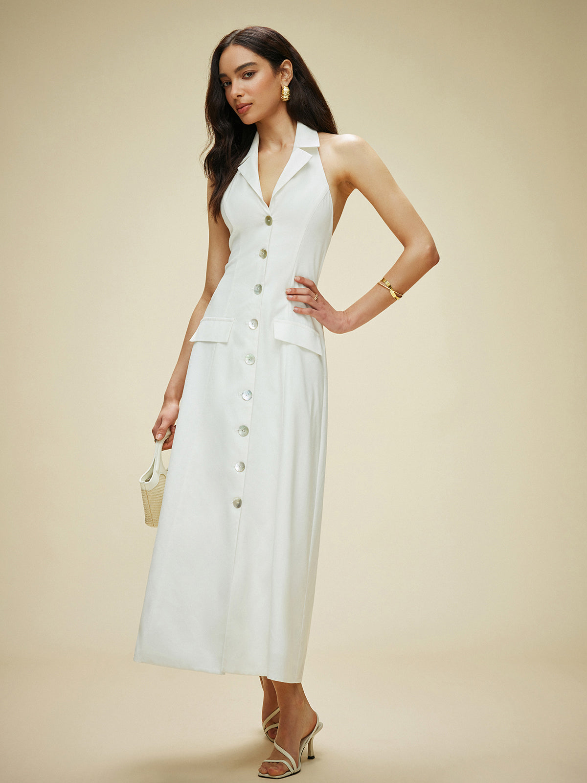 Vestido halter con bolsillos y lazo en la espalda de algodón y lino