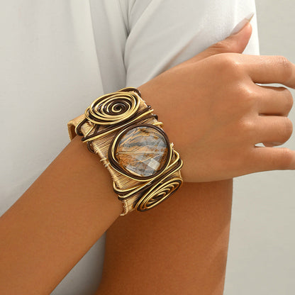 Pulsera abierta de hilo con gema redonda retorcida