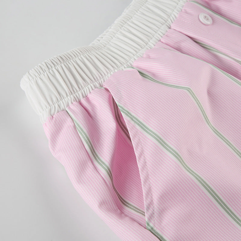 Pantalones cortos chic a rayas con bloques de color y corte holgado