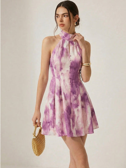 Minivestido fluido sin mangas con escote halter y corte en A