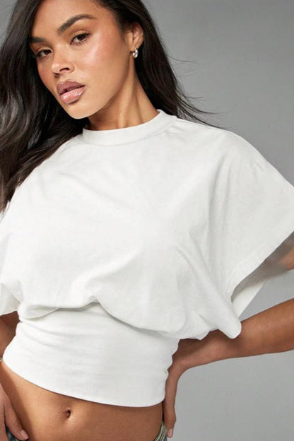 Camiseta de manga corta suelta con cuello redondo liso