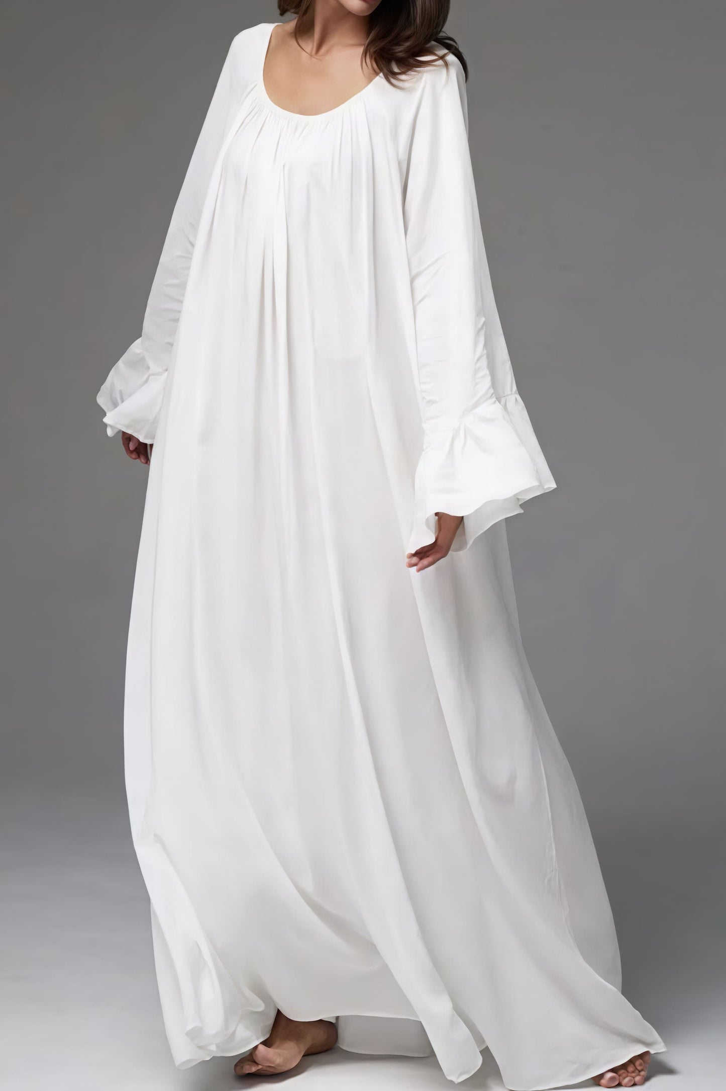 Vestido maxi suelto holgado con bajo acampanado liso