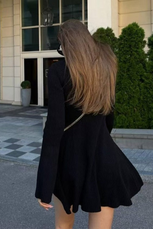 Vestido tipo suéter acampanado de manga larga