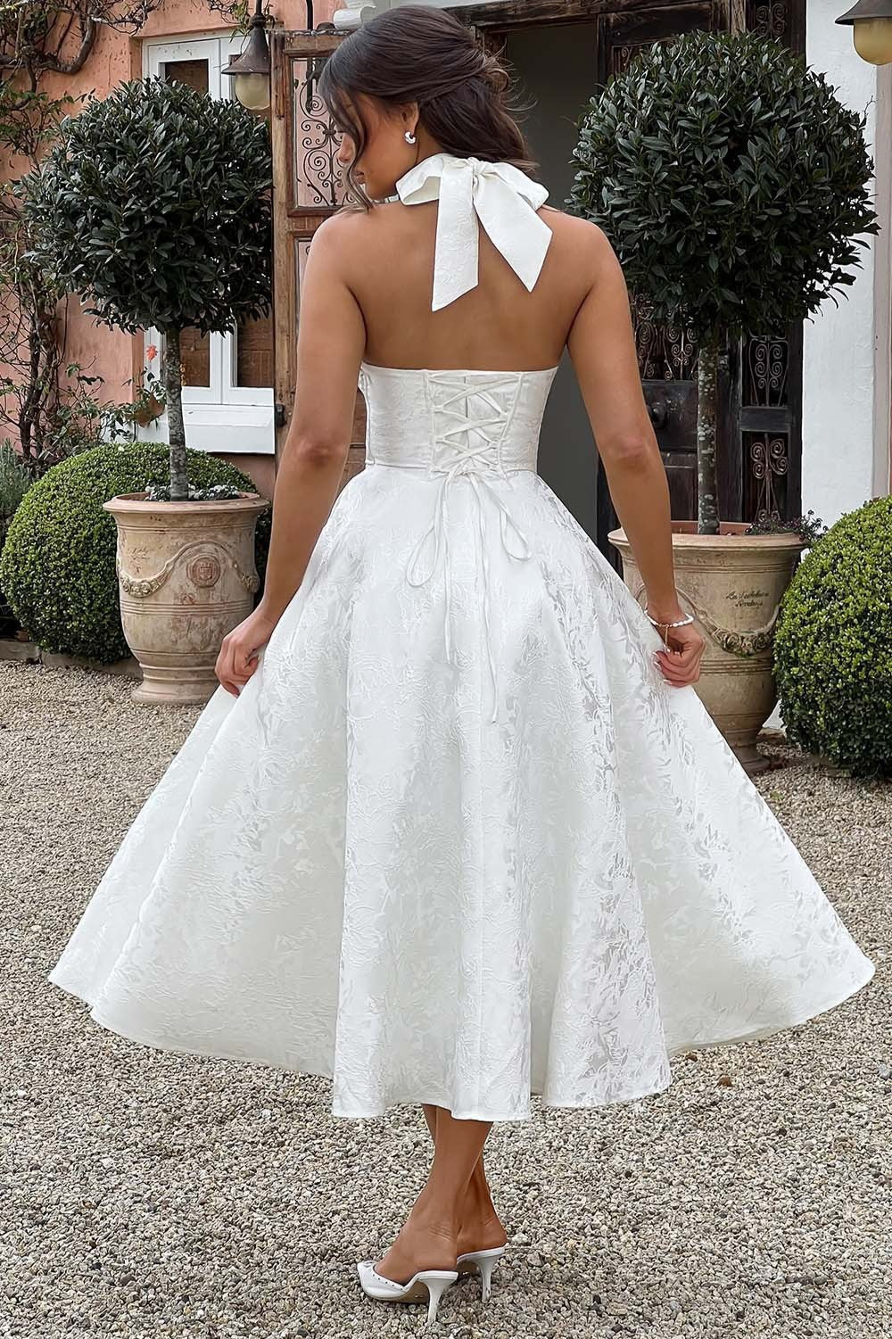 Vestido de fiesta jacquard con cuello halter en V