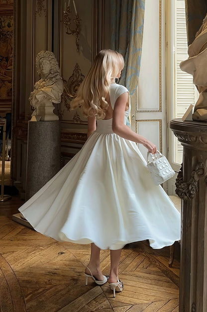 Vestido midi minimalista liso sin espalda con vuelo