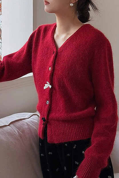 Cárdigan con botones, cuello en V y lazo decorativo