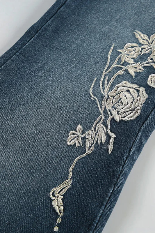Vaqueros acampanados vintage bordados con plantas