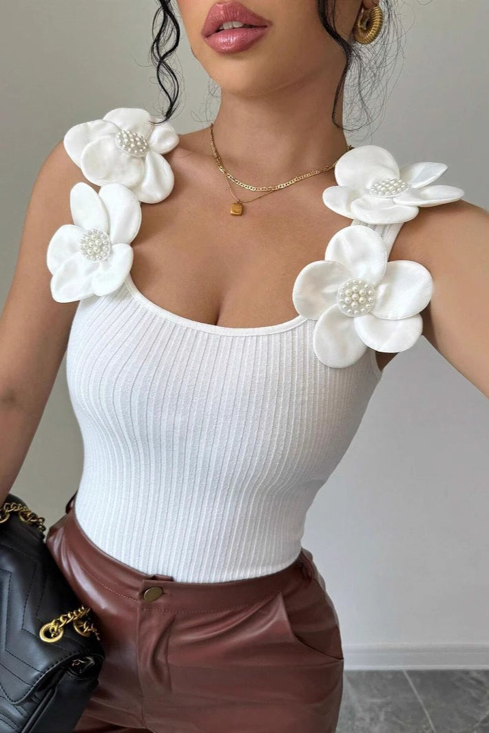 Top de punto con aplique floral