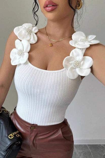Top de punto con aplique floral