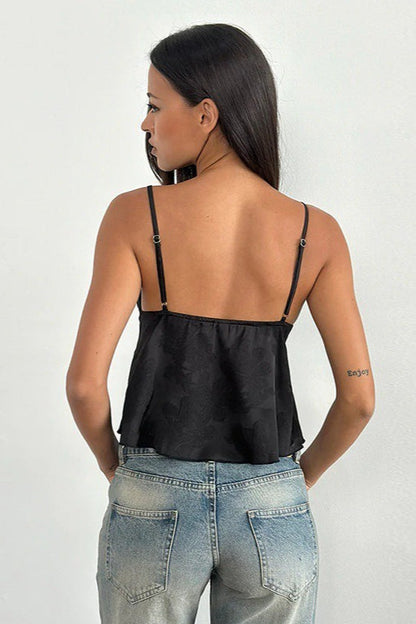 Top corsetero jacquard floral sólido escotado