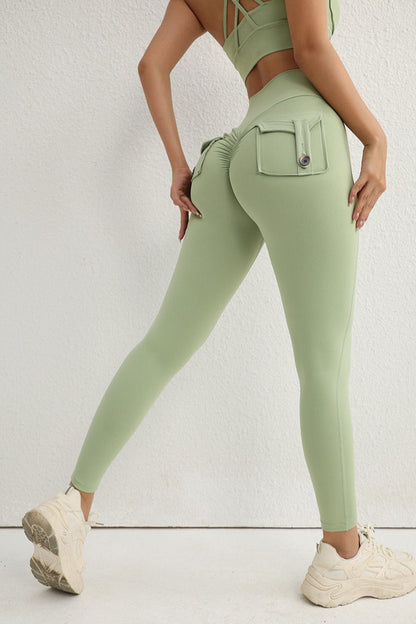 Leggings con botón utilitario de talle alto y efecto push-up