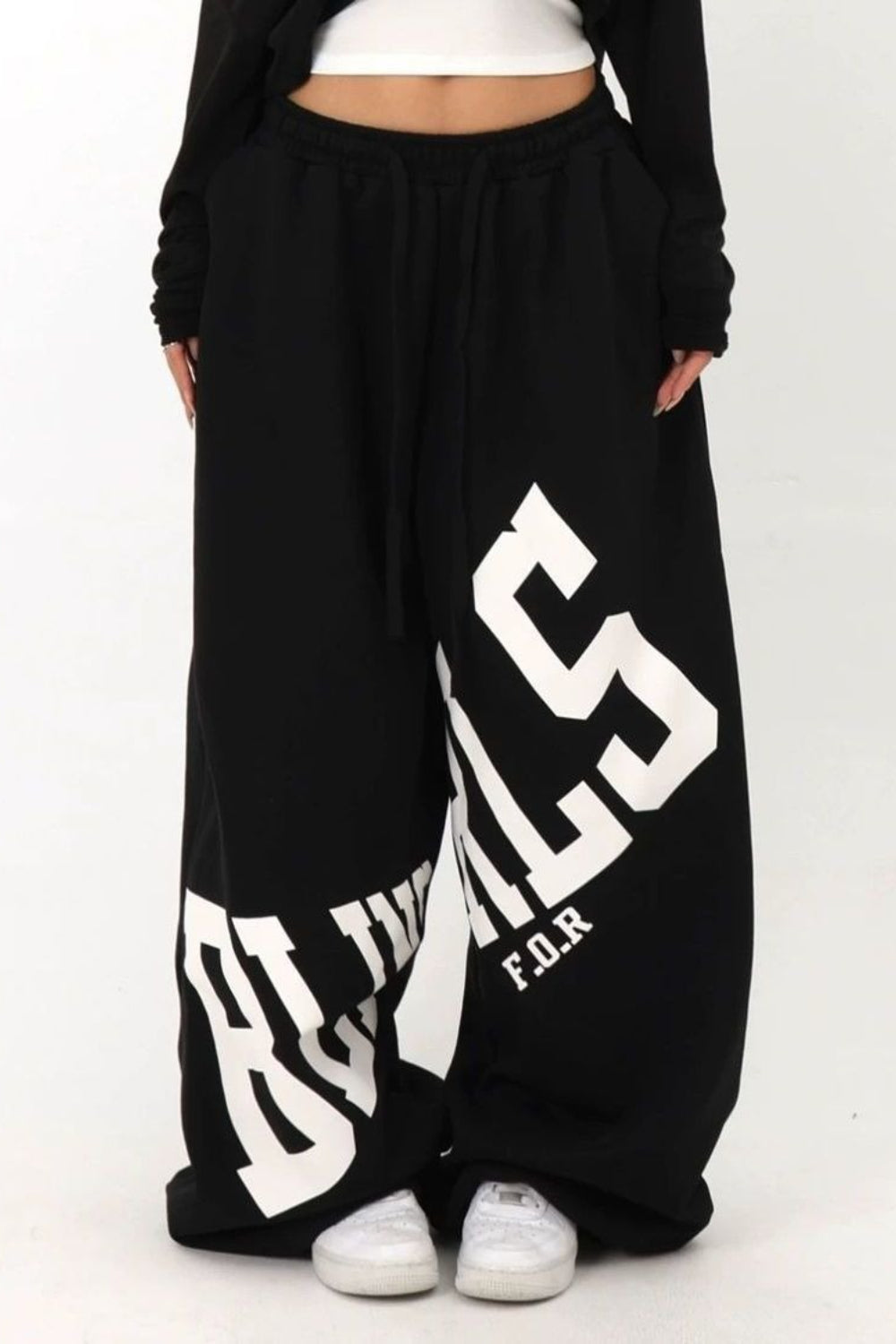 Pantalones casuales sueltos con estampado de letras elásticas
