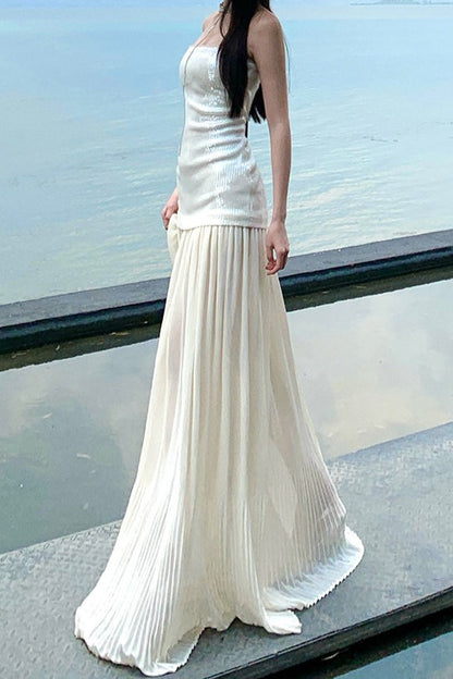 Vestido largo con lentejuelas, sin tirantes y fluido