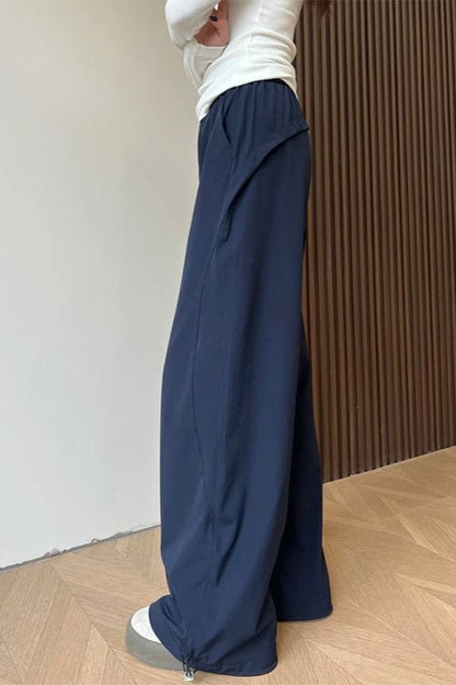 Pantalones deportivos sólidos de pierna ancha elásticos