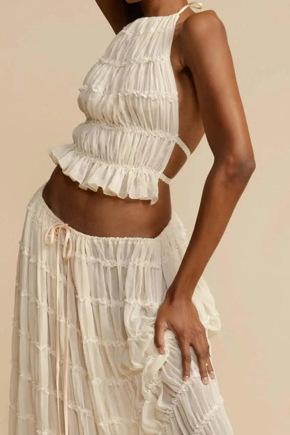 Vestido bohemio con top fruncido estilo halter y falda maxi