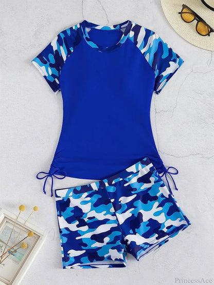 Conjunto de dos piezas de shorts y camiseta de lycra con estampado de camuflaje