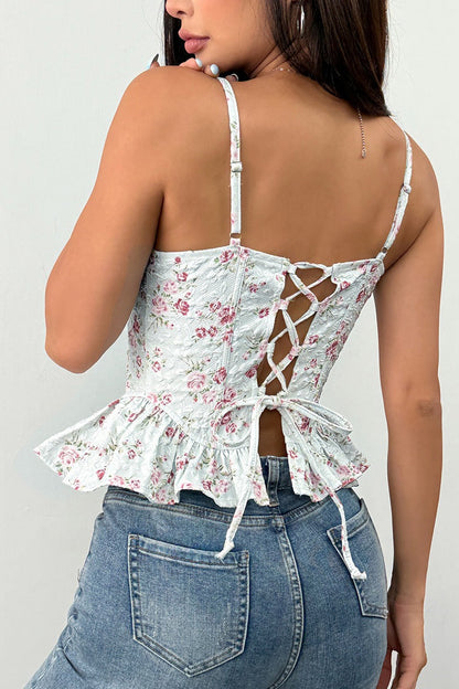 Top de tirantes con volantes irregulares y lazo con estampado floral