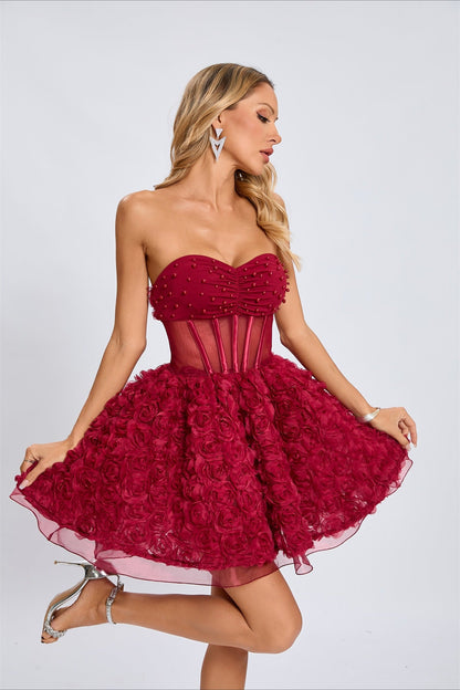Vestido de fiesta sin tirantes con cuentas y mangas abullonadas