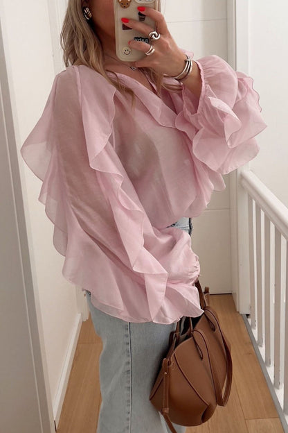Blusa de moda con cuello en V y volantes para ir a la oficina