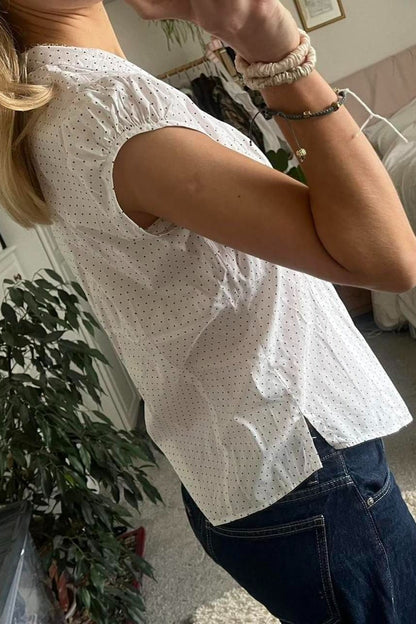 Blusa versátil a cuadros rojos y blancos