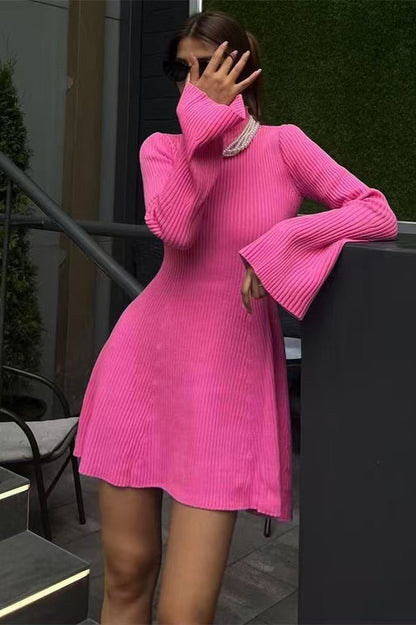 Vestido tipo suéter acampanado de manga larga