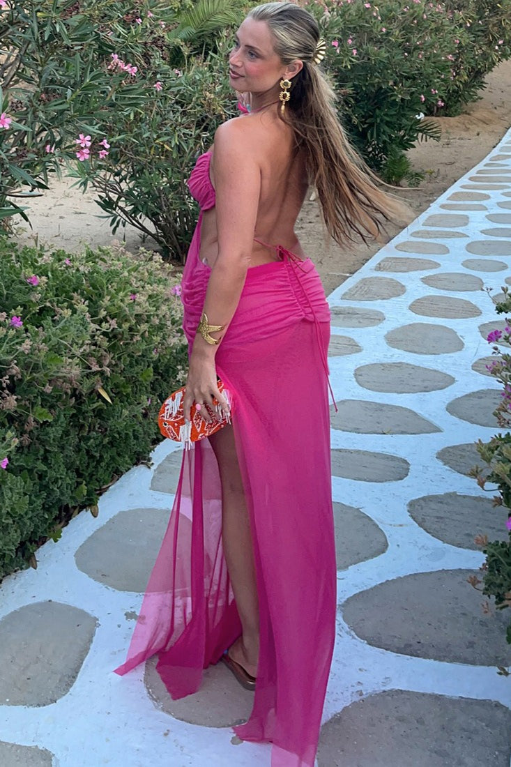 Vestido largo con aberturas, lazo en la cintura y cuello halter transparente