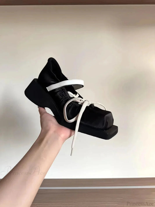 Dark Platform Moving Tennis Shoe