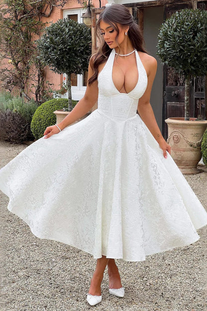 Vestido de fiesta jacquard con cuello halter en V