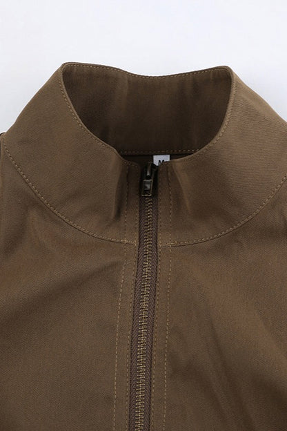 Chaqueta utilitaria con cinturón y bolsillos con cremallera