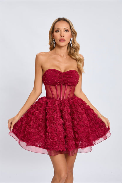Vestido de fiesta sin tirantes con cuentas y mangas abullonadas