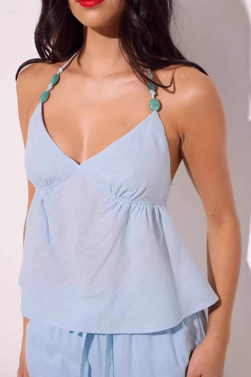 Top halter minimalista sexy con abalorios y color liso