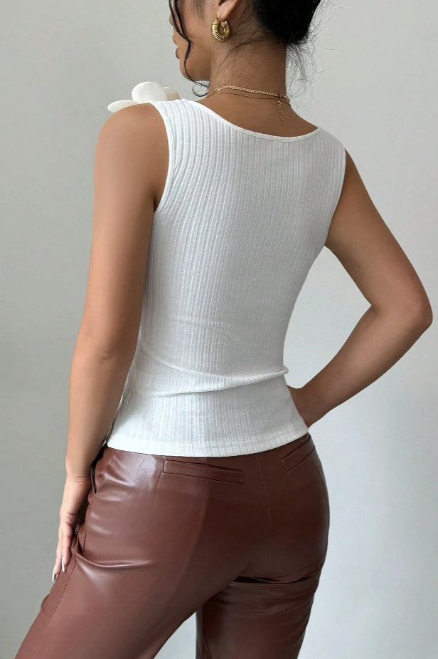 Top de punto con aplique floral
