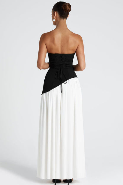Vestido formal estilo bustier fluido con bloques de color y nudo