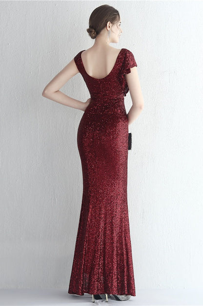 Vestido de gala de sirena con purpurina, cuello alto y abertura