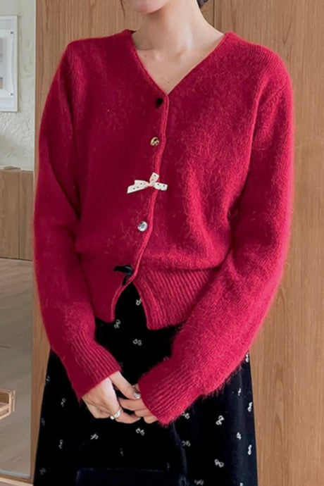 Cárdigan con botones, cuello en V y lazo decorativo