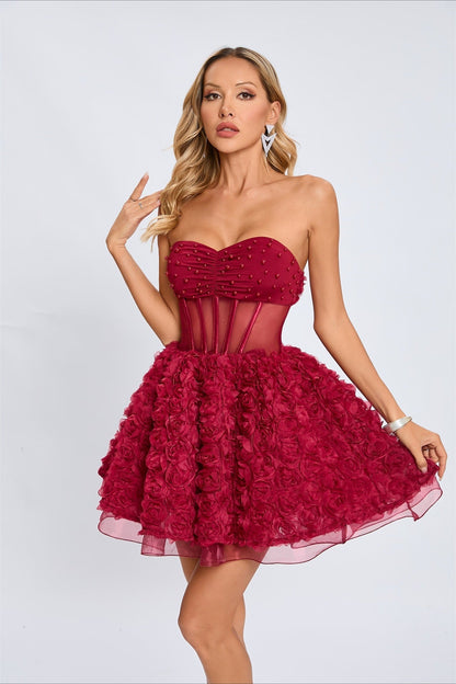 Vestido de fiesta sin tirantes con cuentas y mangas abullonadas