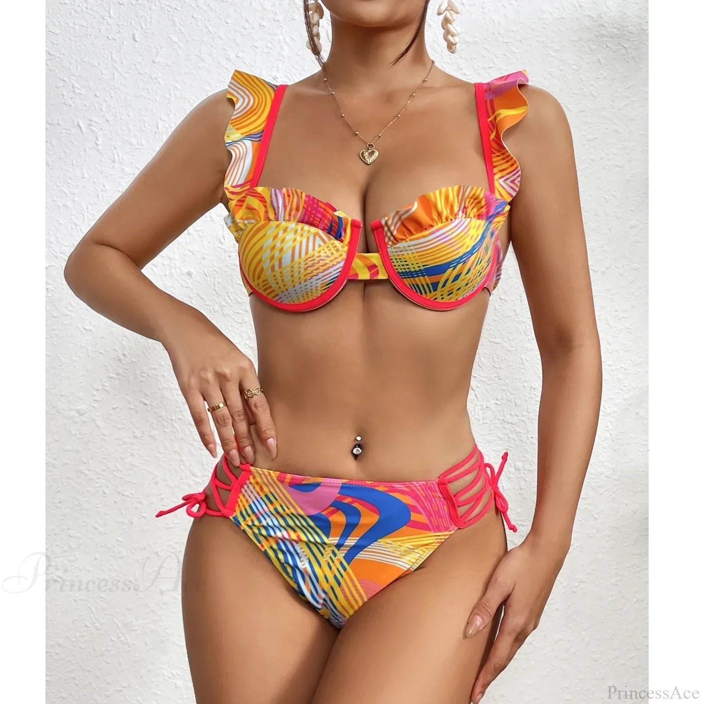 Conjunto retro de dos piezas con estampado de hojas y cuello halter