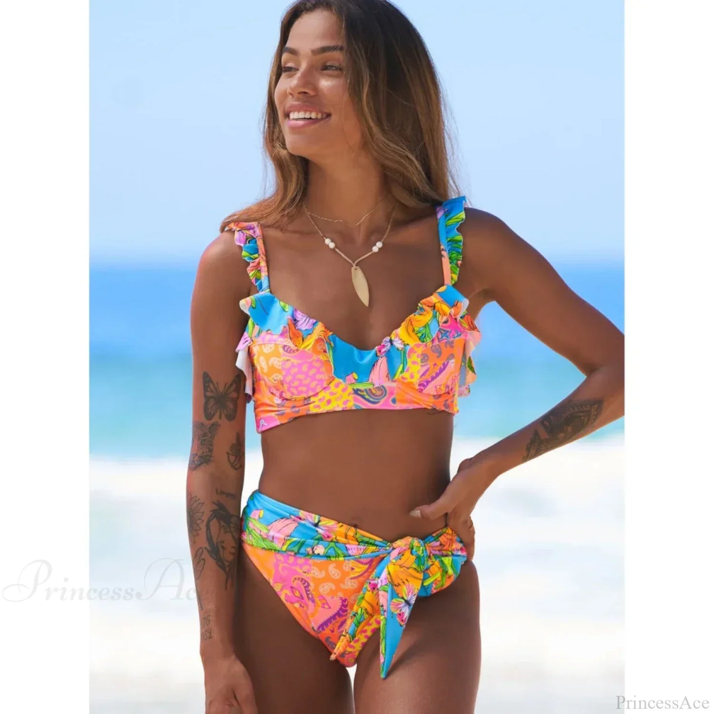 Conjunto retro de dos piezas con estampado de hojas y cuello halter